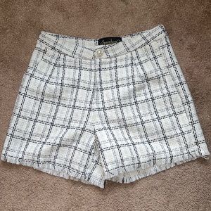 BLACK AND WHITE tweed shorts with fringe